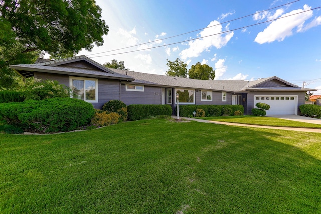 2180 Oak Ridge Dr, Redding, CA 96001 - ranch-style home with a garage, a front yard, and concrete driveway
