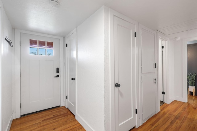 2180 Oak Ridge Dr, Redding, CA 96001 - hallway with light wood-style flooring and baseboards