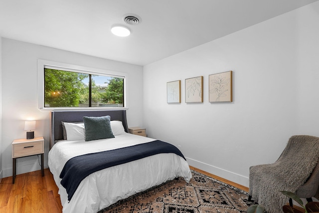 2180 Oak Ridge Dr, Redding, CA 96001 - bedroom with baseboards and wood finished floors