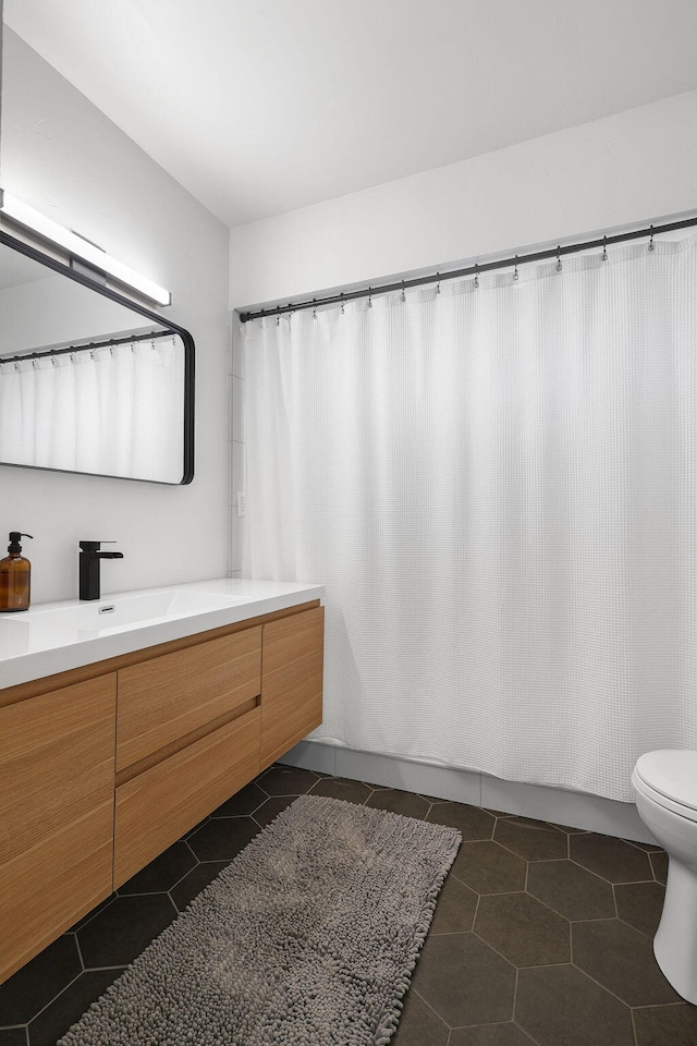 2180 Oak Ridge Dr, Redding, CA 96001 - bathroom featuring vanity, tile patterned flooring, and a shower with shower curtain