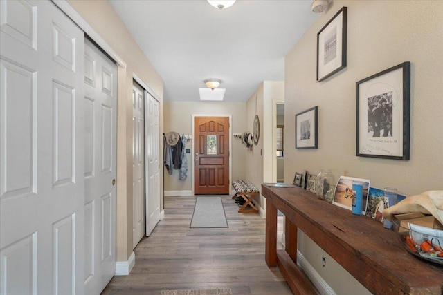 2025 El Verano St, Redding, CA 96002 - foyer with baseboards and wood finished floors