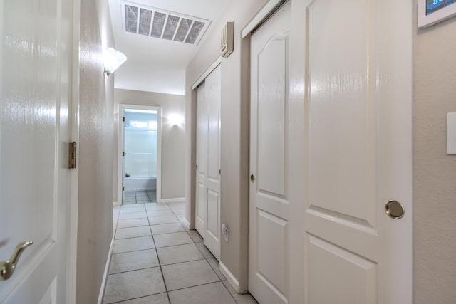 17400 Pittim Dr, Redding, CA 96003 - corridor with light tile patterned floors and baseboards