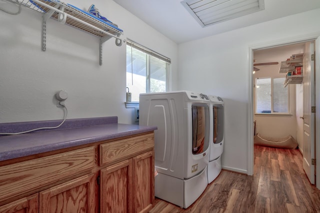 17400 Pittim Dr, Redding, CA 96003 - washroom featuring washer and clothes dryer, light wood finished floors, and baseboards