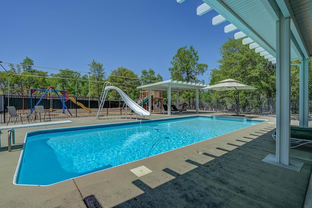 17400 Pittim Dr, Redding, CA 96003 - view of pool featuring a water slide and a patio