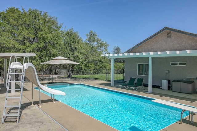 17400 Pittim Dr, Redding, CA 96003 - view of swimming pool with a water slide, a patio area, and a diving board