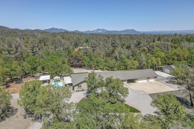 17400 Pittim Dr, Redding, CA 96003 - view of subject property featuring a heavily wooded area and a mountain backdrop