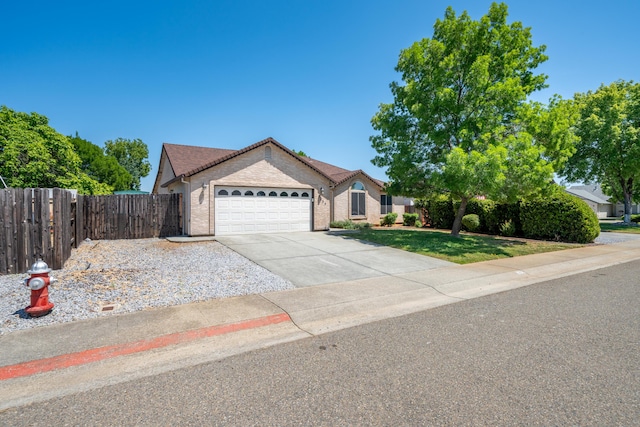 3255 Wandsworth Dr, Shasta Lake, CA 96019 - ranch-style home with a garage, brick siding, and concrete driveway