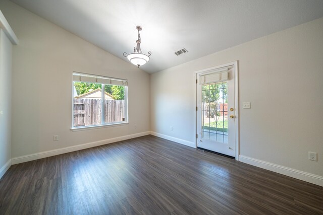 3255 Wandsworth Dr, Shasta Lake, CA 96019 - spare room featuring plenty of natural light, dark wood-type flooring, and lofted ceiling