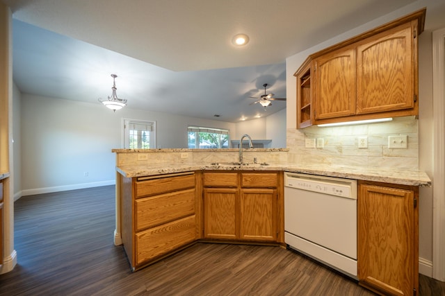 3255 Wandsworth Dr, Shasta Lake, CA 96019 - kitchen with white dishwasher, a peninsula, dark wood-style floors, ceiling fan, and backsplash