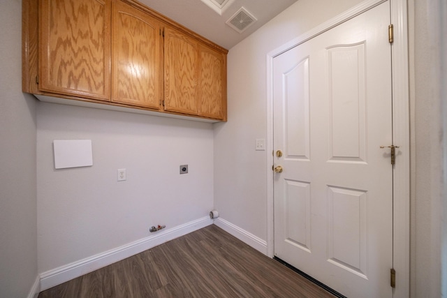 3255 Wandsworth Dr, Shasta Lake, CA 96019 - laundry room with cabinet space, hookup for an electric dryer, and dark wood-type flooring