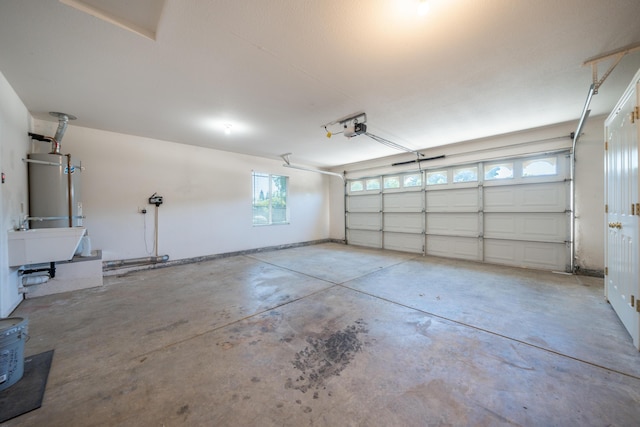 3255 Wandsworth Dr, Shasta Lake, CA 96019 - garage featuring gas water heater and a sink
