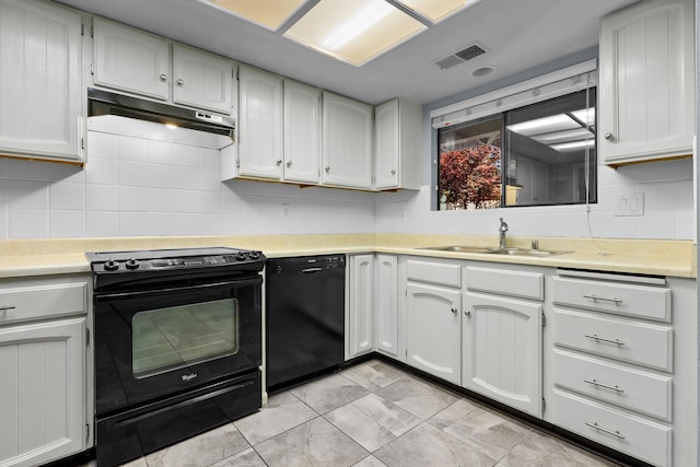 1401 Casa Vereda Way, Redding, CA 96003 - kitchen featuring black appliances, under cabinet range hood, light countertops, backsplash, and white cabinets