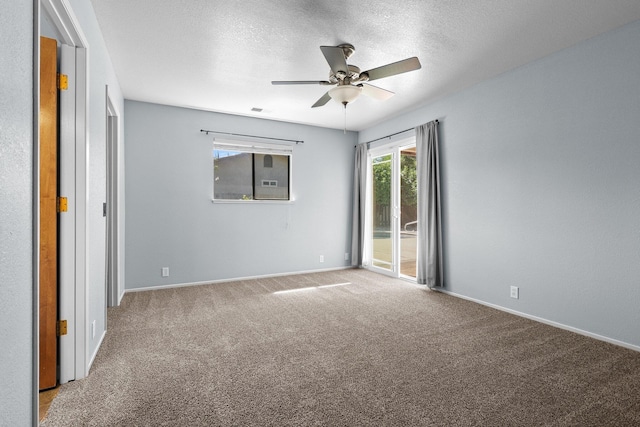 1401 Casa Vereda Way, Redding, CA 96003 - unfurnished bedroom with access to outside, light carpet, a textured ceiling, and a ceiling fan