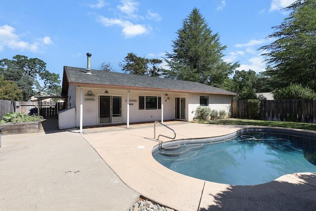 1401 Casa Vereda Way, Redding, CA 96003 - view of swimming pool with a patio area and a fenced backyard