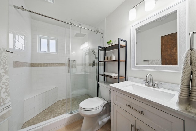 2034 Wilder Dr, Redding, CA 96002 - full bathroom featuring a stall shower, toilet, and vanity