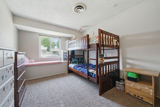 2034 Wilder Dr, Redding, CA 96002 - carpeted bedroom with a textured ceiling and baseboards