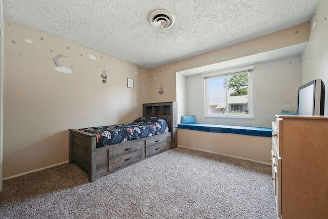 2034 Wilder Dr, Redding, CA 96002 - carpeted bedroom with a textured ceiling and baseboards