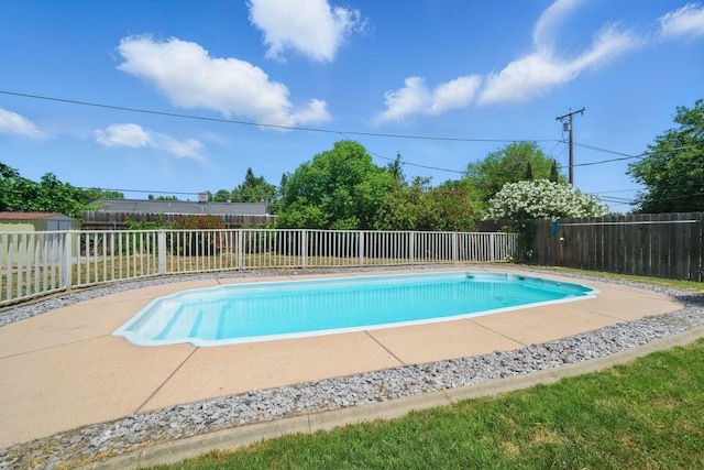 2034 Wilder Dr, Redding, CA 96002 - view of swimming pool with a fenced backyard and a patio