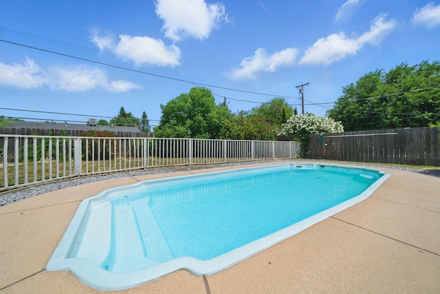 2034 Wilder Dr, Redding, CA 96002 - view of swimming pool featuring a fenced backyard