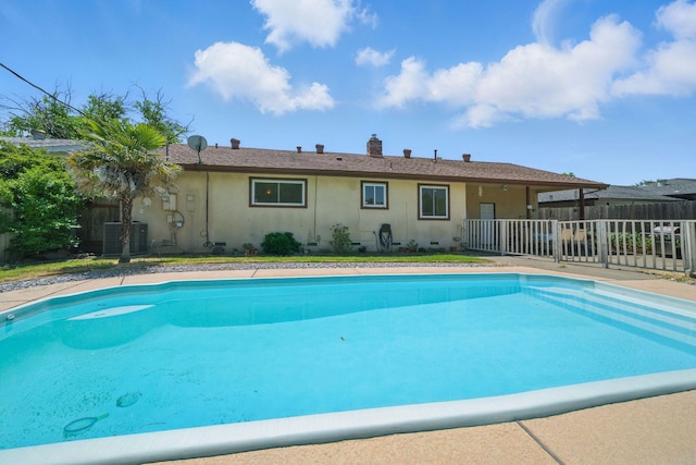 2034 Wilder Dr, Redding, CA 96002 - view of swimming pool with central air condition unit