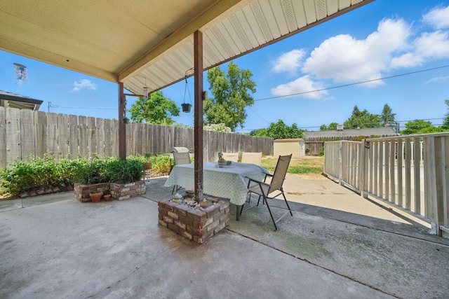 2034 Wilder Dr, Redding, CA 96002 - fenced backyard with outdoor dining area and a patio area