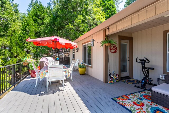 7256 Shasta Forest Dr, Shingletown, CA 96088 - wooden terrace with outdoor dining area