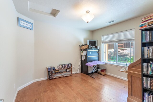7256 Shasta Forest Dr, Shingletown, CA 96088 - miscellaneous room featuring light wood-style floors and baseboards