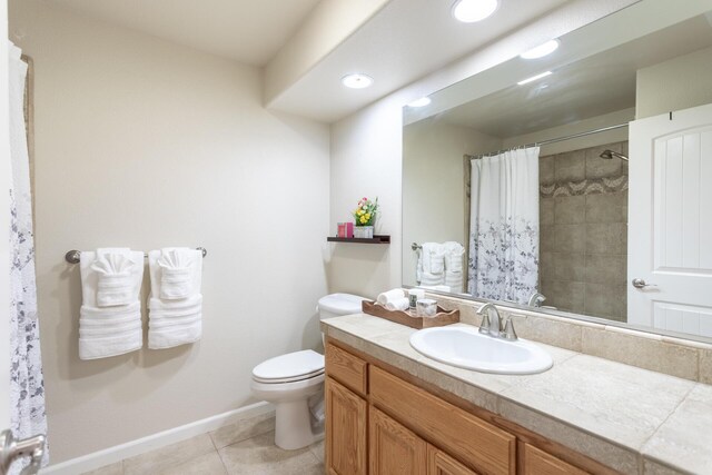 7256 Shasta Forest Dr, Shingletown, CA 96088 - full bath featuring toilet, vanity, tile patterned flooring, a shower with shower curtain, and baseboards