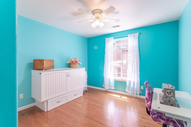 7256 Shasta Forest Dr, Shingletown, CA 96088 - bedroom with wood finished floors, baseboards, and a ceiling fan