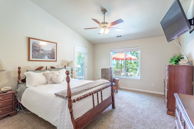 7256 Shasta Forest Dr, Shingletown, CA 96088 - bedroom with light carpet, multiple windows, lofted ceiling, baseboards, and ceiling fan