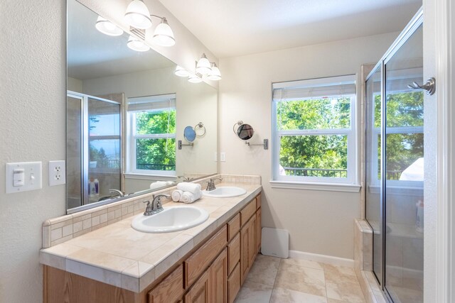 7256 Shasta Forest Dr, Shingletown, CA 96088 - full bathroom with plenty of natural light, double vanity, and an enclosed shower