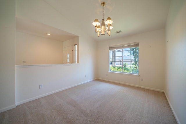 2169 Hope Ln, Redding, CA 96003 - carpeted spare room with a chandelier, lofted ceiling, and baseboards