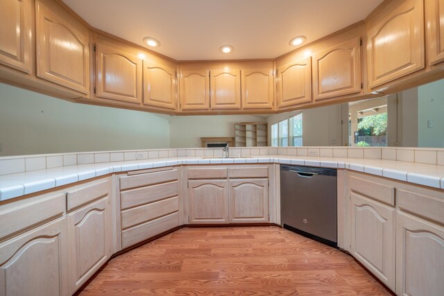 2169 Hope Ln, Redding, CA 96003 - kitchen featuring stainless steel dishwasher, a sink, recessed lighting, light brown cabinetry, and light wood-style floors