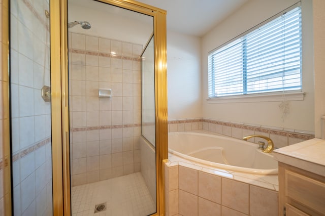 2169 Hope Ln, Redding, CA 96003 - bathroom featuring a garden tub, a stall shower, and vanity