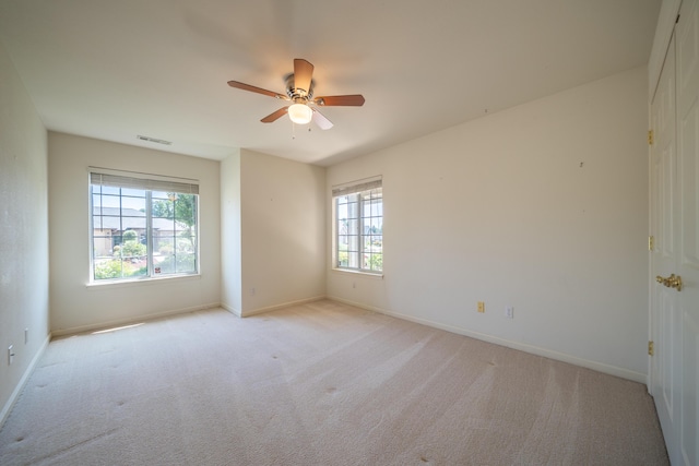 2169 Hope Ln, Redding, CA 96003 - unfurnished room with a ceiling fan, light carpet, and baseboards