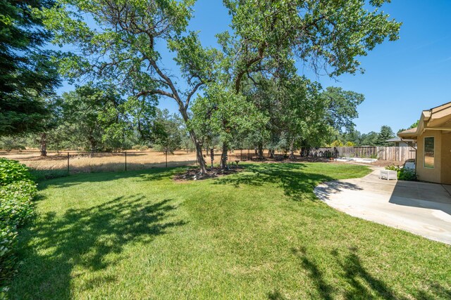 2169 Hope Ln, Redding, CA 96003 - view of yard featuring a patio