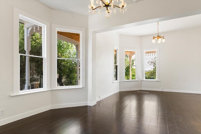 1764 Chestnut St, Redding, CA 96001 - empty room featuring a chandelier and hardwood / wood-style floors