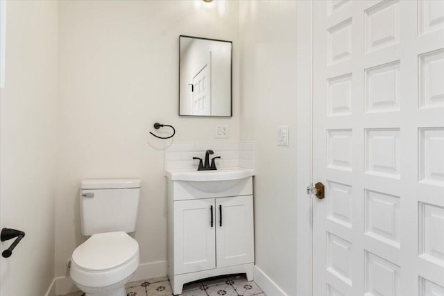 1764 Chestnut St, Redding, CA 96001 - half bath featuring vanity and decorative backsplash