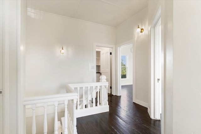 1764 Chestnut St, Redding, CA 96001 - hallway featuring an upstairs landing, dark wood finished floors, and crown molding