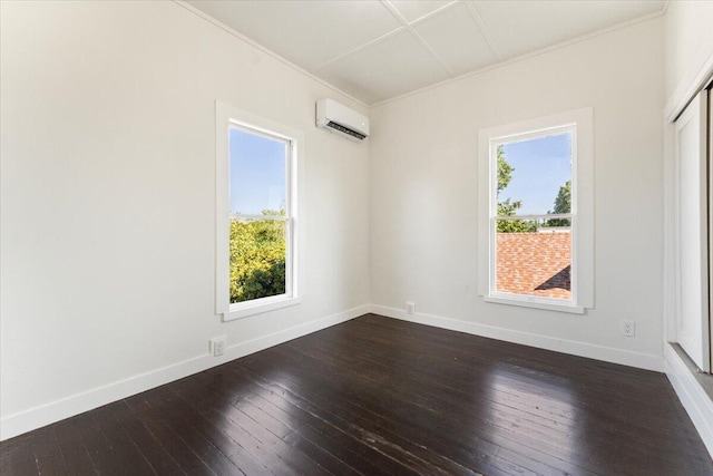 1764 Chestnut St, Redding, CA 96001 - empty room featuring a wall mounted air conditioner, dark wood-style floors, and ornamental molding