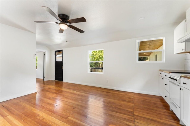 1764 Chestnut St, Redding, CA 96001 - unfurnished living room featuring a ceiling fan and light wood-style floors