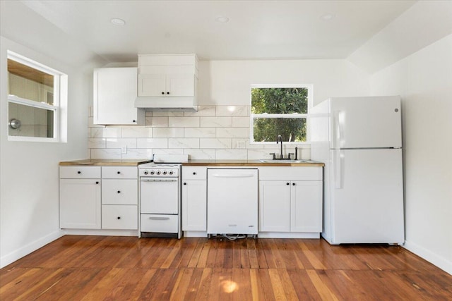 1764 Chestnut St, Redding, CA 96001 - kitchen with white appliances, backsplash, dark wood-type flooring, and white cabinetry