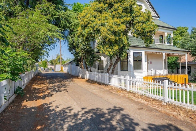 1764 Chestnut St, Redding, CA 96001 - view of front of home with covered porch and a fenced front yard