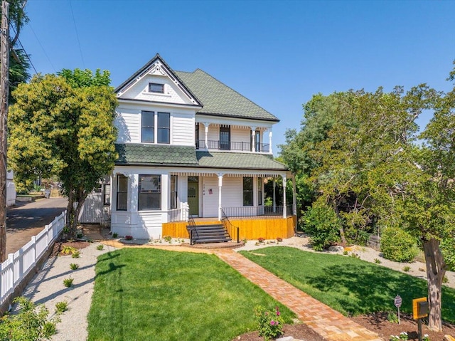 1764 Chestnut St, Redding, CA 96001 - victorian home featuring a porch and a balcony