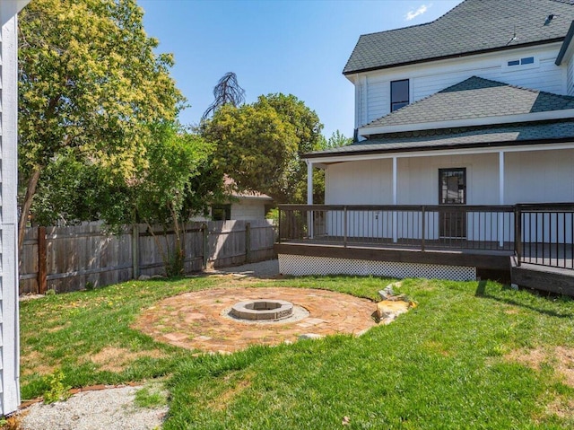 1764 Chestnut St, Redding, CA 96001 - view of yard with an outdoor fire pit, a patio, and a wooden deck