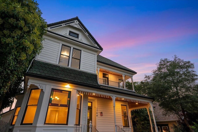 1764 Chestnut St, Redding, CA 96001 - victorian house featuring a balcony and a porch