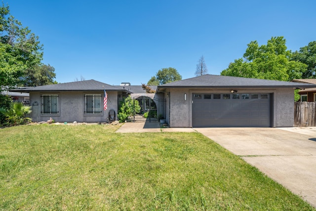 1136 Woodland Ter, Redding, CA 96002 - single story home featuring stucco siding, concrete driveway, and an attached garage