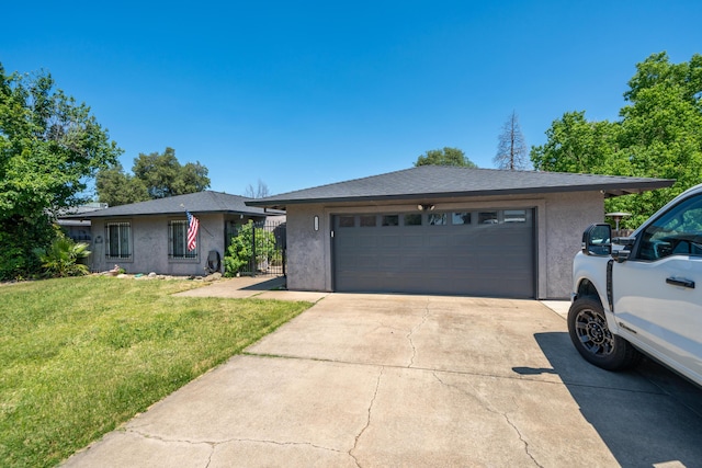 1136 Woodland Ter, Redding, CA 96002 - single story home featuring stucco siding, a front yard, and concrete driveway