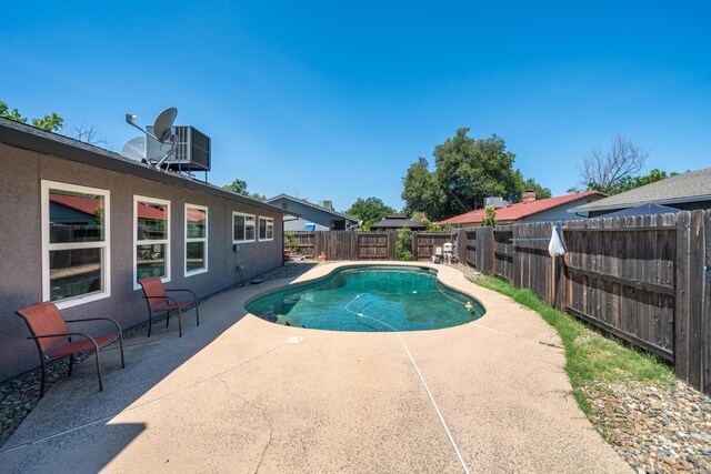 1136 Woodland Ter, Redding, CA 96002 - view of pool featuring a patio area and a fenced backyard