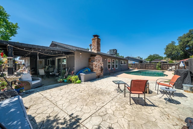 1136 Woodland Ter, Redding, CA 96002 - fenced backyard with a patio